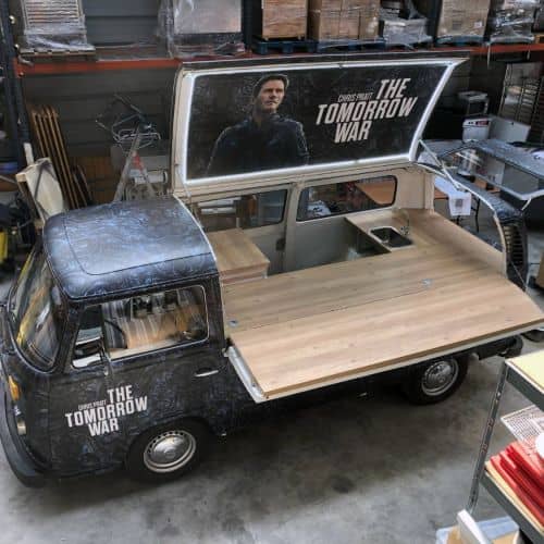 Covering Combi VW The Tomorrow War — vue aérienne comptoir bois