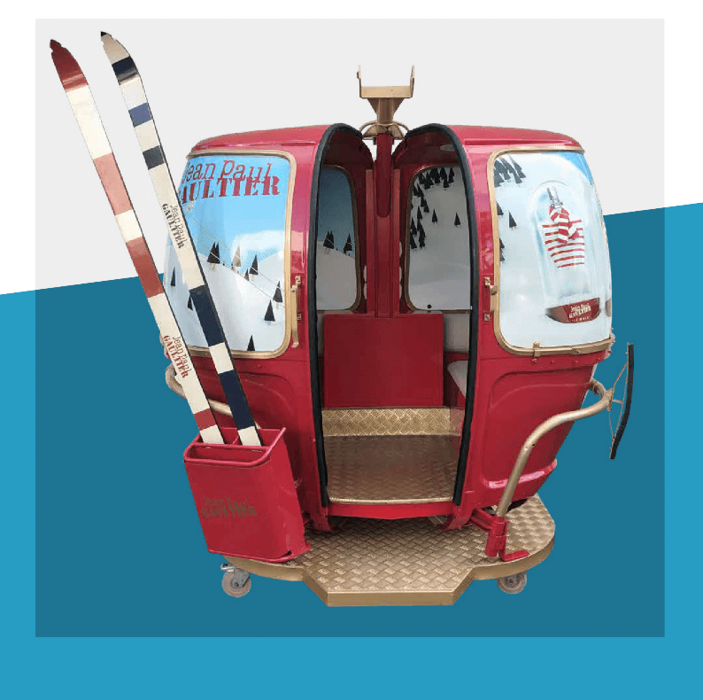 Télécabine Megg Jean-Paul Gaultier — covering rouge luxe et montagne